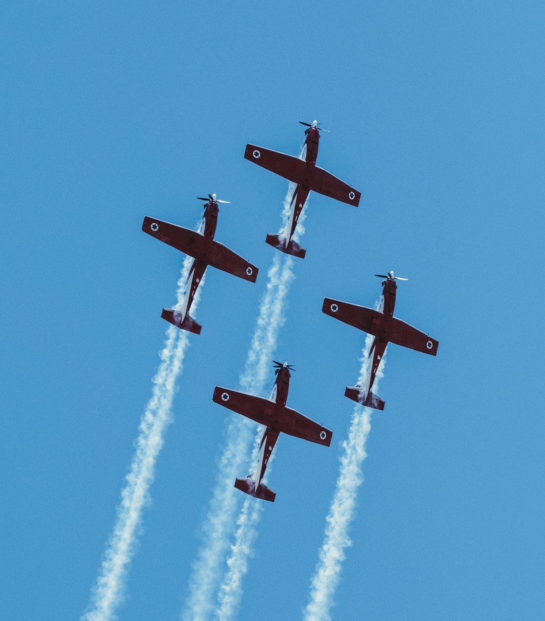 four-airplanes-are-flying-in-formation-in-the-sky-dlvxpbehnje